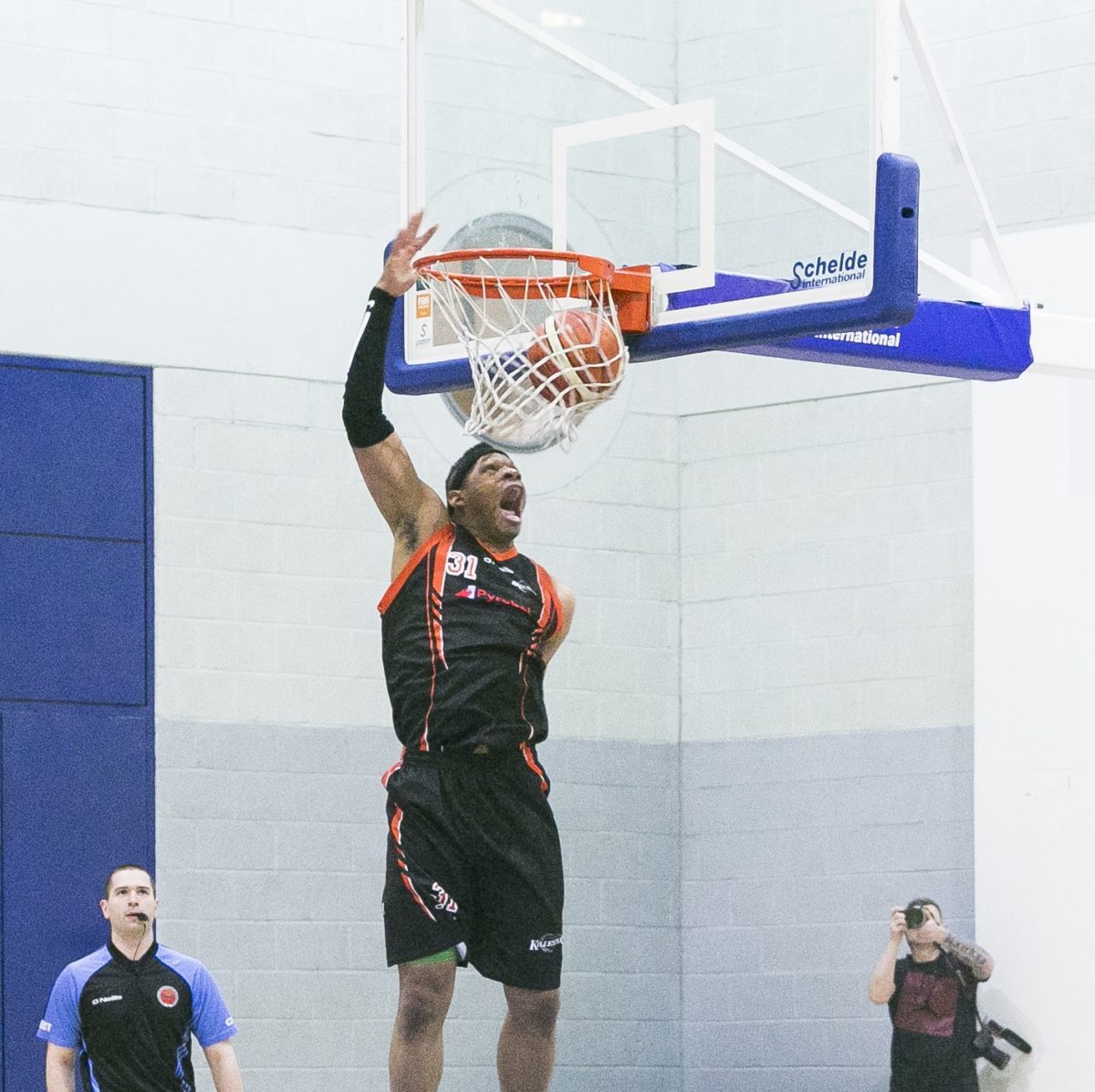 Jermaine Turner dunking in his last ever game - Pic: Michelle LaGrue
