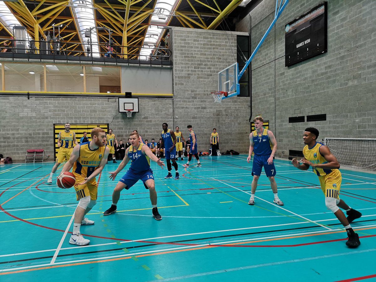 UCD Marian's Matt Kelly and Cameron Smith in action against DCU Saints