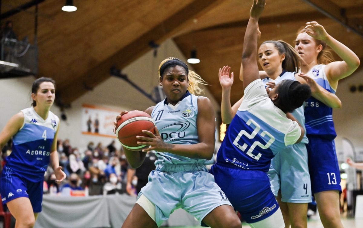 Heavy traffic for DCU Mercy's Alarie Mayze in the Irish cup final against Glanmire