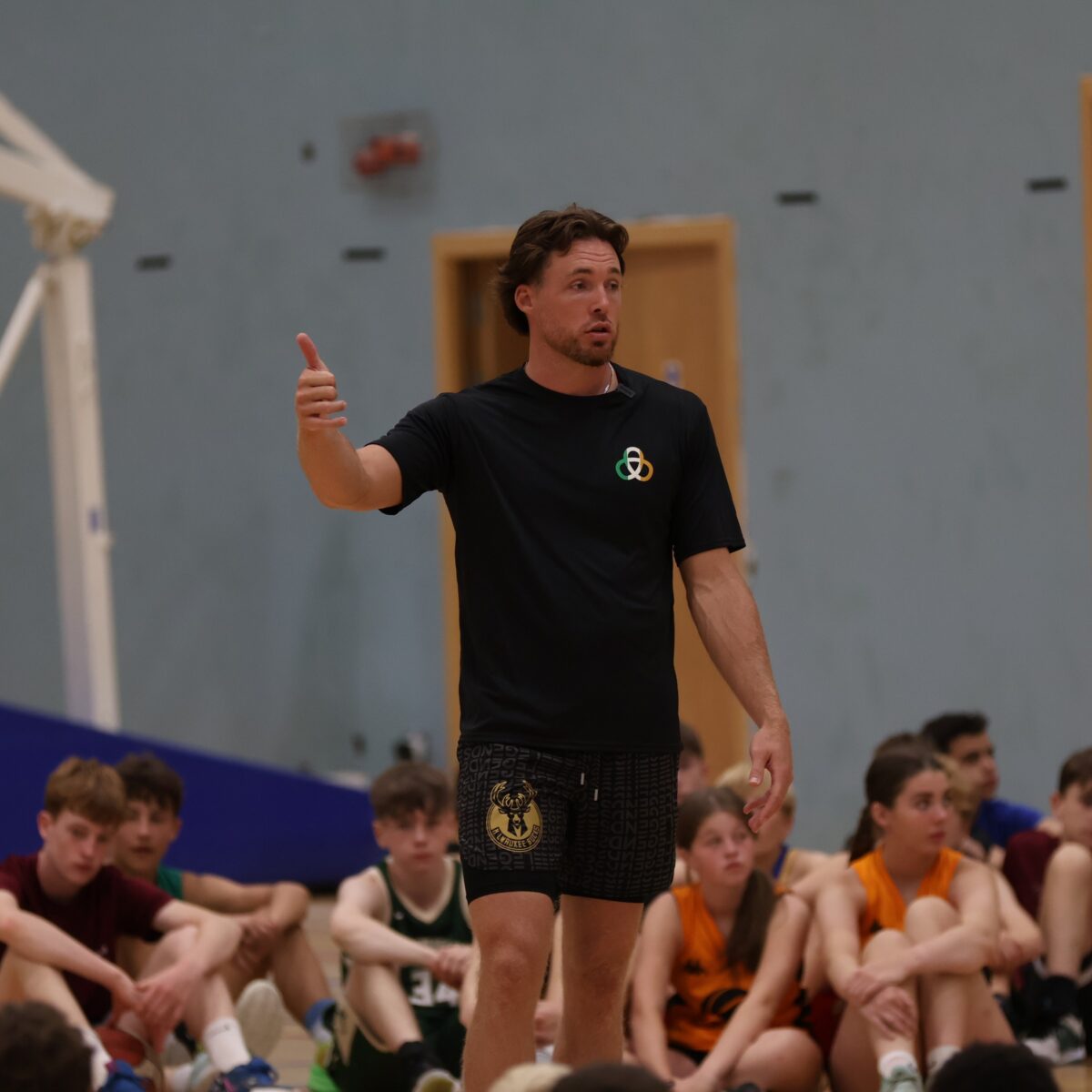 Pat Connaughton teaching young Irish basketball players at his coaching clinic in Galway