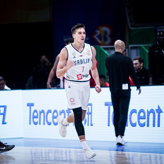Bogdan Bogdanovic leads Serbia against Dennis Schroeder and Germany in the 2023 FIBA Basketball World Cup final. Photo: FIBA