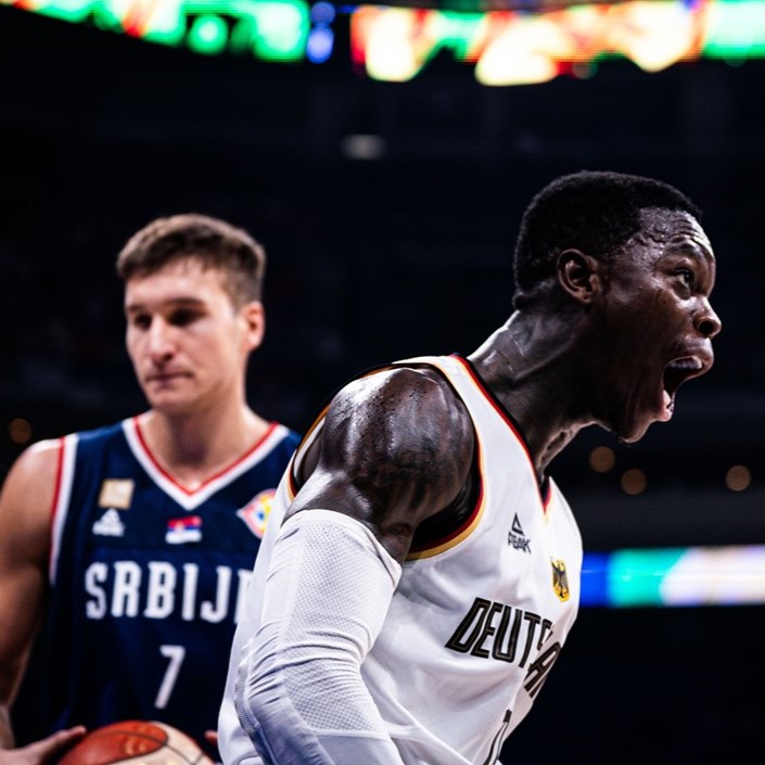 The difference between joy and despondence. Dennis Schroeder celebrates while Bogdan Bogdanovic laments as Germany beat Serbia to win the 2023 FIBA Basketball World Cup.